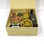 Traditional Handcrafted Gifts from Kerala filled with Kathakali stand, Brass Dabara, and more
