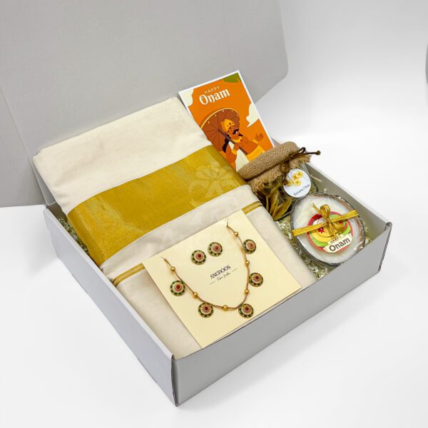 Graceful Onam Saree Gift Box with Floral Jewelry & Candle - Image 3