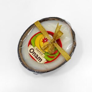 Coconut shell candle With onam badge